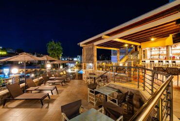 Theos Village Hotel & Apartments