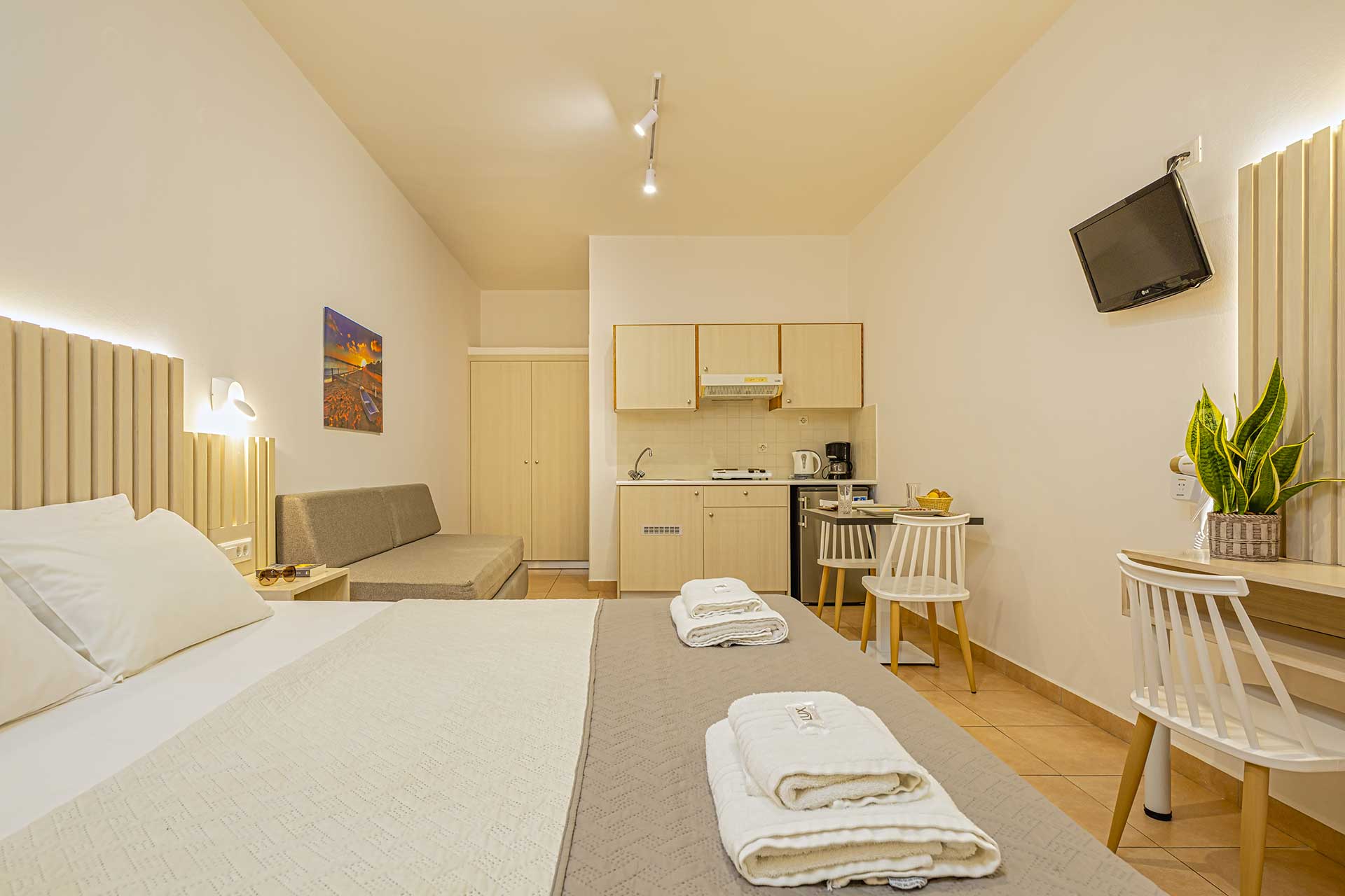 Theos Village Hotel & Apartments